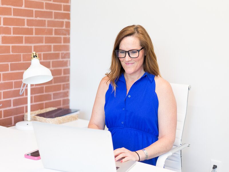 A team member working through product notes at a desk